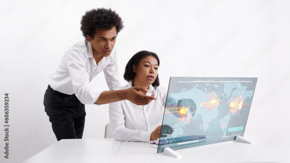 Team of IT security experts discussing recent global hacking attack on servers. Futuristic technology on white background Team of IT security experts discussing recent global hacking attack on servers. Futuristic technology on white background