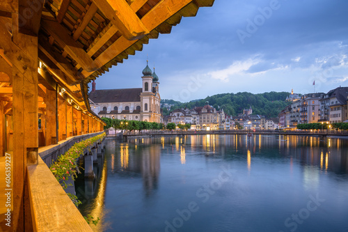 The Legendary Wooden Chapel Bridge, Revealing Lucerne's Old Town Splendor in Switzerland