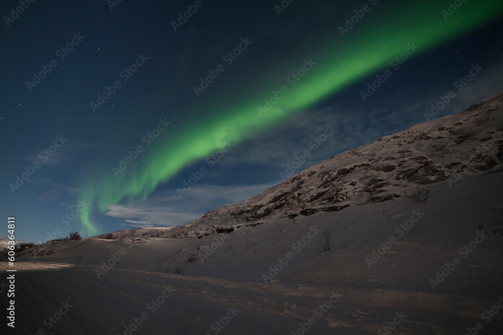 night landscape with northern lights and aurora winter by the sea