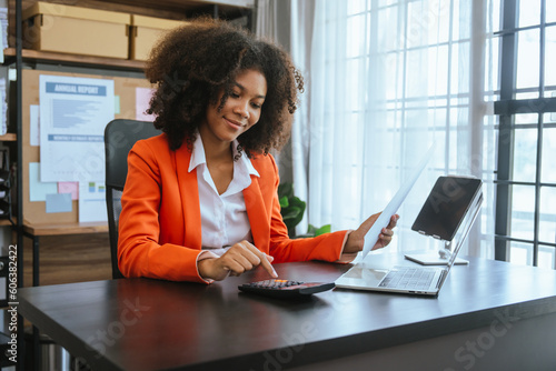 Obraz na plátně Working smart, African american business woman working audit balance sheet, job