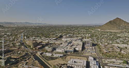Scottsdale Arizona Aerial v3 drone reverse flyover villa monterey residential housing neighborhood capturing downtown cityscape with camelback mountain view - Shot with Mavic 3 Cine - February 2022