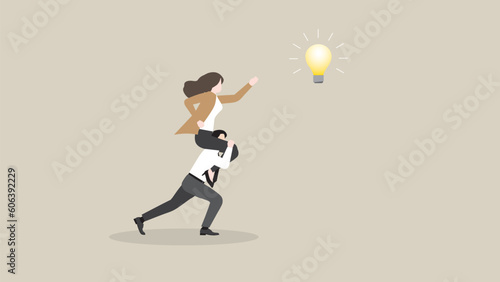 A businesswoman searches for success. Boss rides piggyback on an employee team staff and grabs a light bulb. Business opportunity, ambition, intention, work hard, reach target, goal and idea concept.