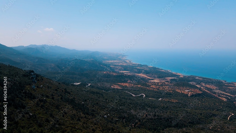 Aerial view of Esentepe, Kaplica, Bahceli villages in Kyrenia in North Cyprus on sunny day with clear sky.