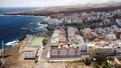Drone shot of La Jaca town with sea view in Tenerife, Canary Islands, Spain