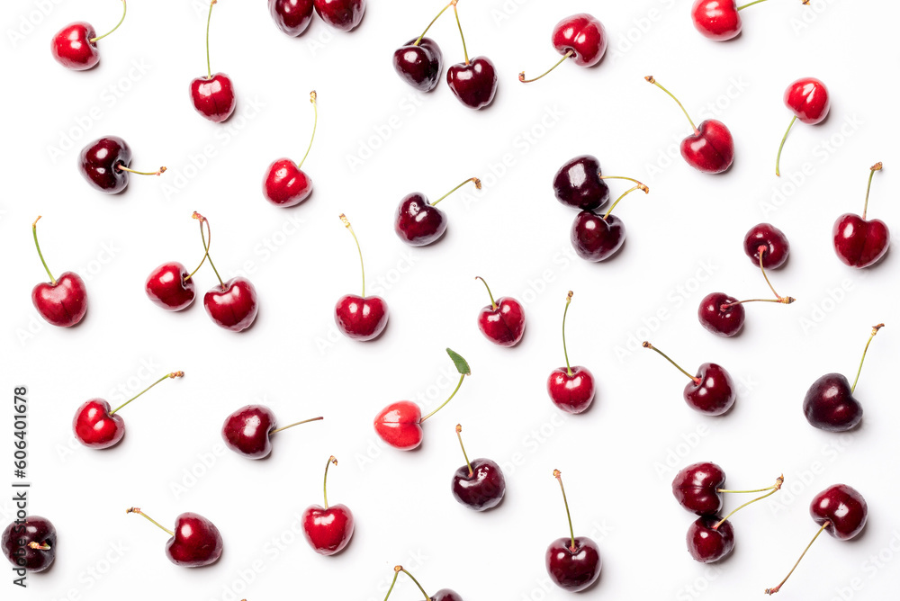 Set of red cherries isolated and separated from each other, on a white background. Nice background of red fruits rich in vitamins Set of red cherries isolated and separated from each other, on a white background. Nice background of red fruits rich in vitamins