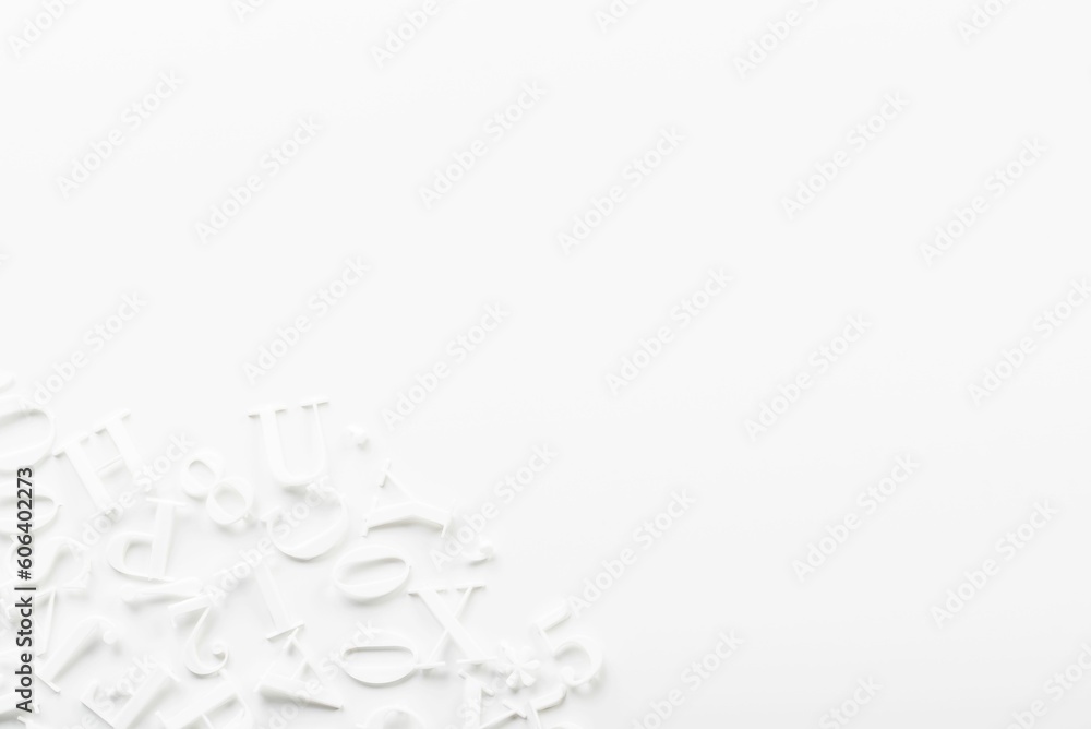 Closeup shot of hite letter board letters on a white background Closeup shot of hite letter board letters on a white background