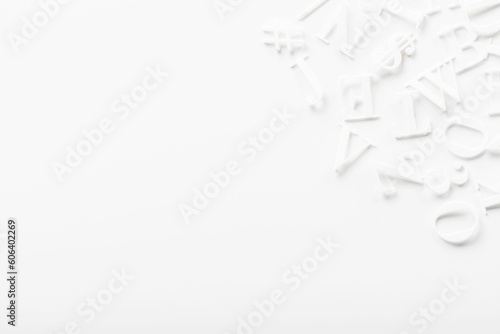 Closeup shot of hite letter board letters on a white background