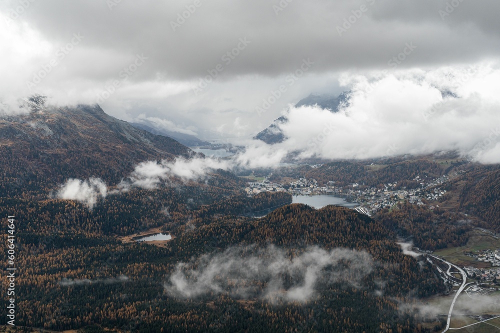 Aerial view of the Engadin with fluffy white clouds
