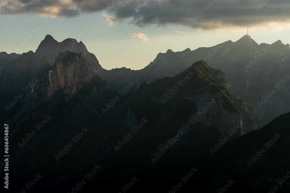 Beautiful landscape of forested mountains during sunrise Beautiful landscape of forested mountains during sunrise