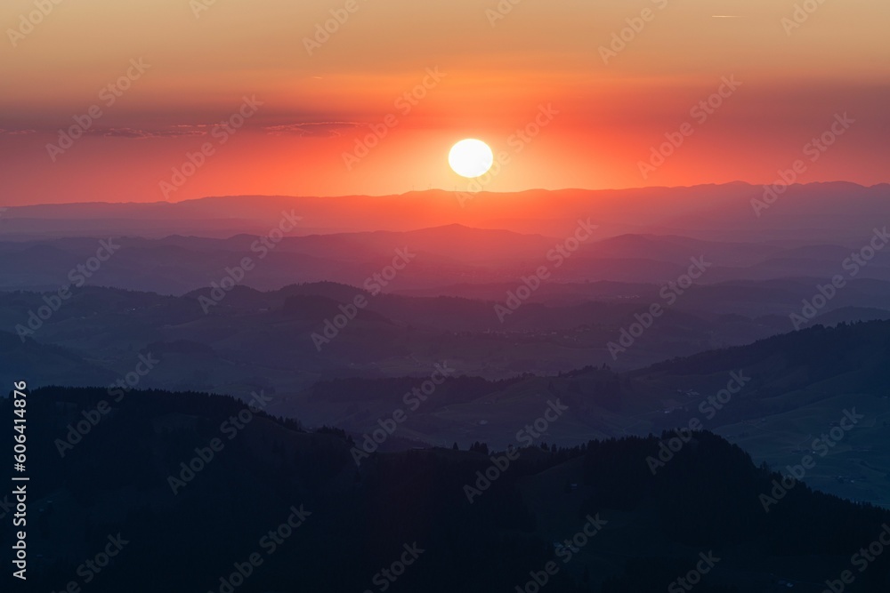 Beautiful landscape of mountains under a clear sky at sunset Beautiful landscape of mountains under a clear sky at sunset