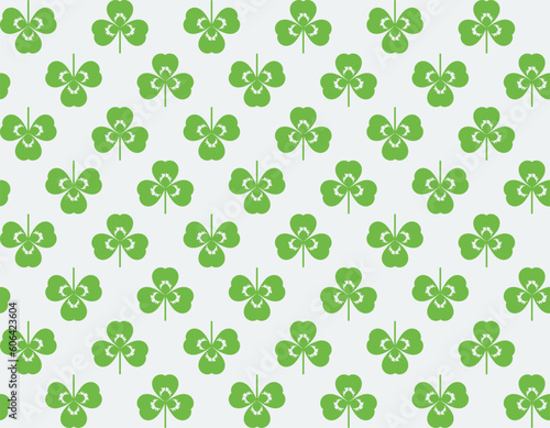Clover  shamrock. Seamless pattern of green clover leaves. Vector illustration isolated on a light gray background.