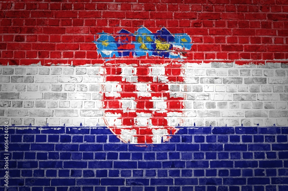 Closeup of the Croatia flag painted on a brick wall in an urban location