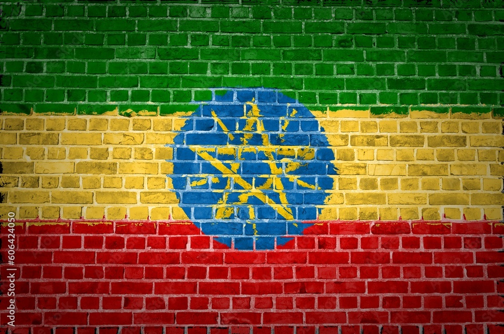 Naklejka premium Image of the Ethiopia flag painted on a brick wall in an urban location