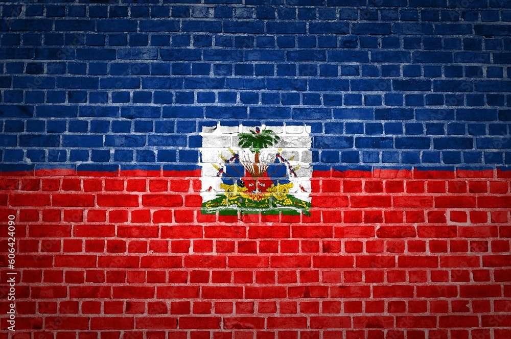 Shot of the Haiti flag painted on a brick wall in an urban location