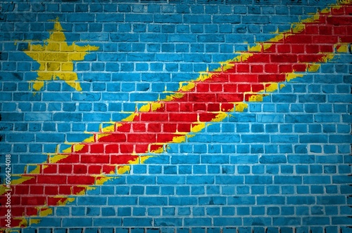 Closeup of the Congo-Kinshasa flag painted on a brick wall in an urban location