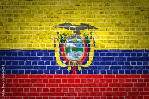 Image of the Ecuador flag painted on a brick wall in an urban location