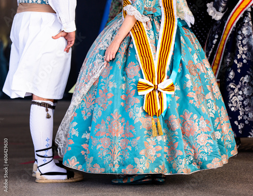 colorful big Valenciana dress, sometimes also called a traje de fallera, fallera costume in english