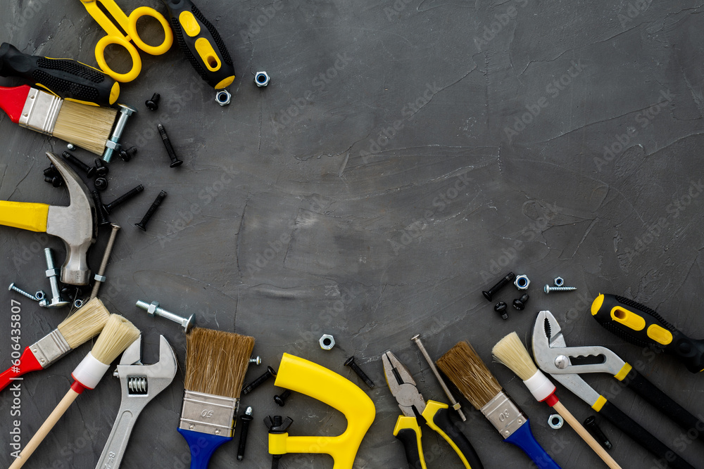 DIY hand tools with hammer and brushes. House improvement concept DIY hand tools with hammer and brushes. House improvement concept