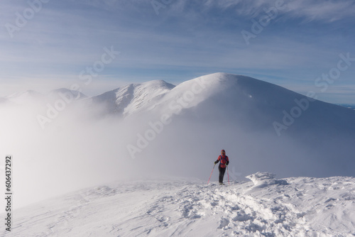 Mountaineer climbing in the snow at tatras Ridge, Poland ans Slovakia © Martin