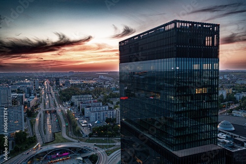 Katowice centre and office towers buildings and Spodek at evening. Aerial drone view. Katowice, Silesia, Poland