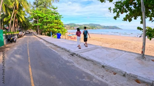 Driving from patong Pa Tong to Prompthep Cape via Kata Beach Karong Beach Naiharn Beach and Ya Nui Beach on the magical island of Phuket Thailand going through beautiful tropical mountains  photo