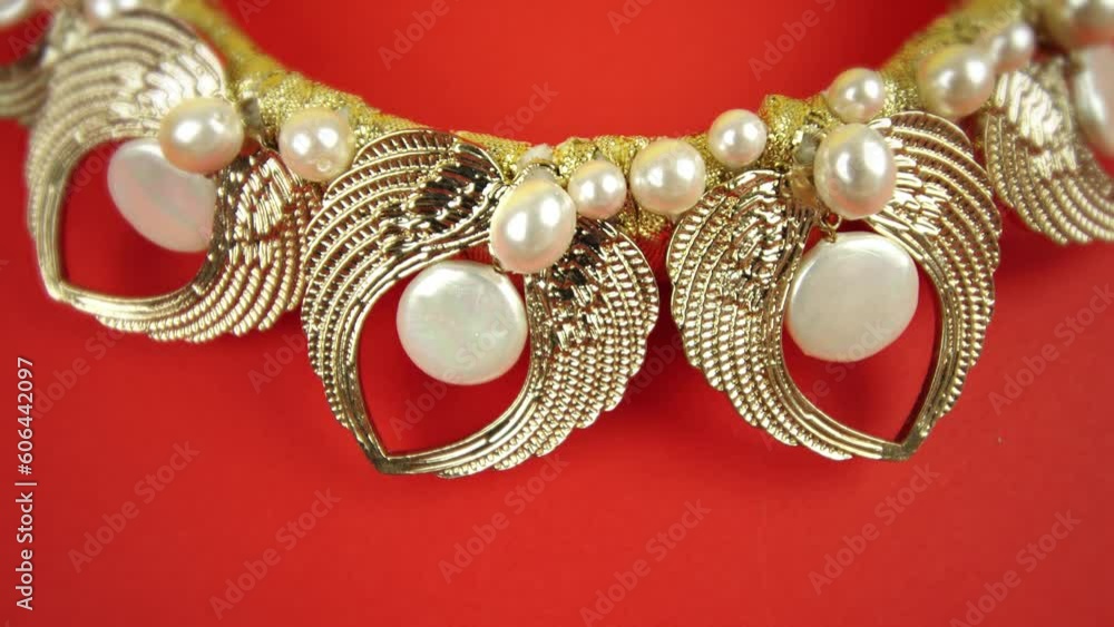 Golden crown with jewels on a red background Golden crown with jewels on a red background