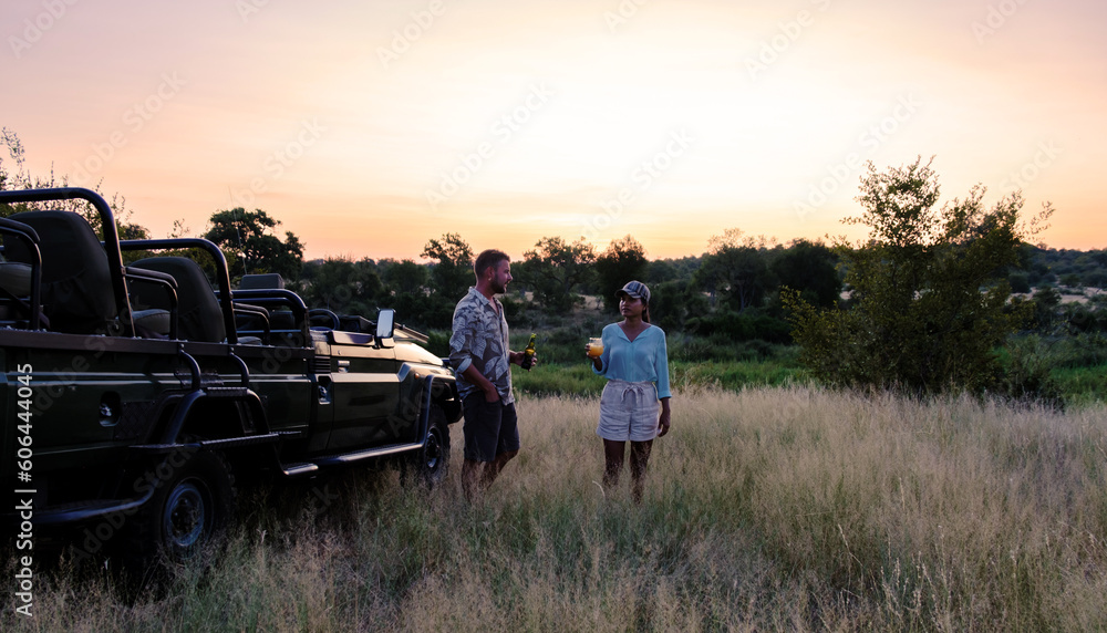 Φωτογραφία Asian women and European men on safari game drive in South Africa Kruger national park