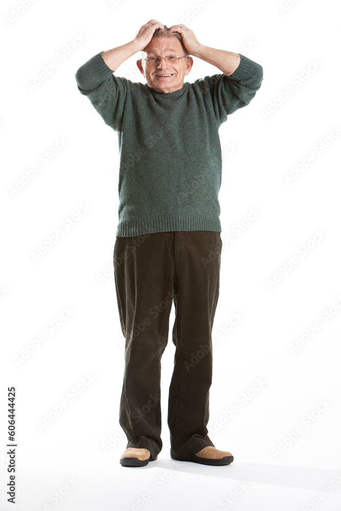 Senior Citizens: Exasperated. A cheeky senior man with his head in his hands. Full length portrait, isolated on white. From a series of related images Senior Citizens: Exasperated. A cheeky senior man with his head in his hands. Full length portrait, isolated on white. From a series of related images