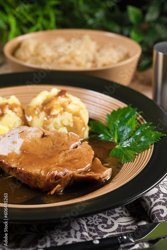 Braised pork neck in own sauce. Shallow depth of field.