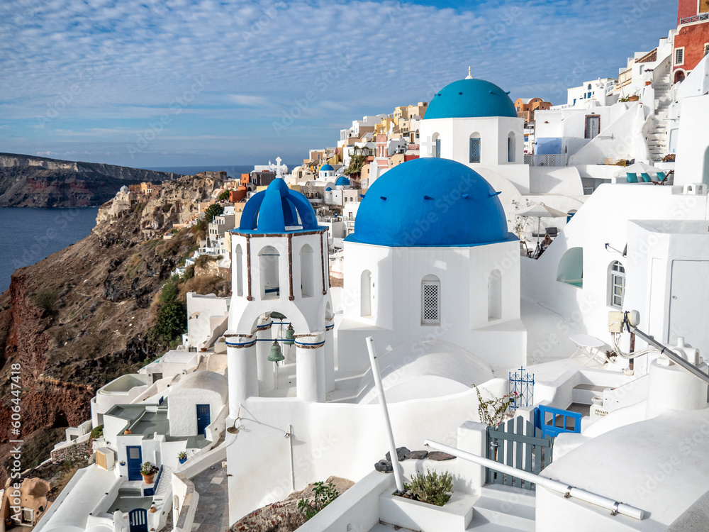 Iconic views of blue domes and white buildings in Santorini, Greece