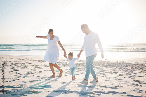 Happy family, holding hands and playing on beach with mockup space for holiday weekend or vacation. Mother, father and child enjoying play time together on ocean coast for fun bonding in nature