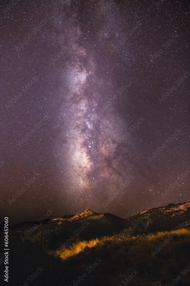 milky way galaxy over the mountain