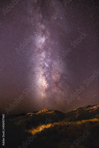 milky way galaxy over the mountain