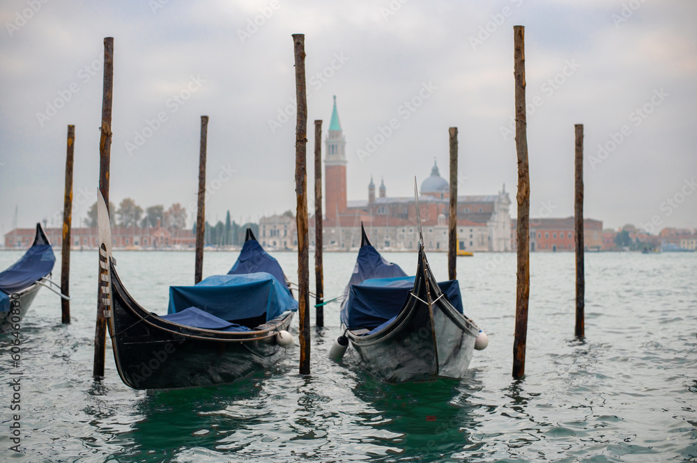 Beautiful view of gondolas and the Cathedral of San Giorgio Maggiore, on an island in the Venetian lagoon, Venice, Italy