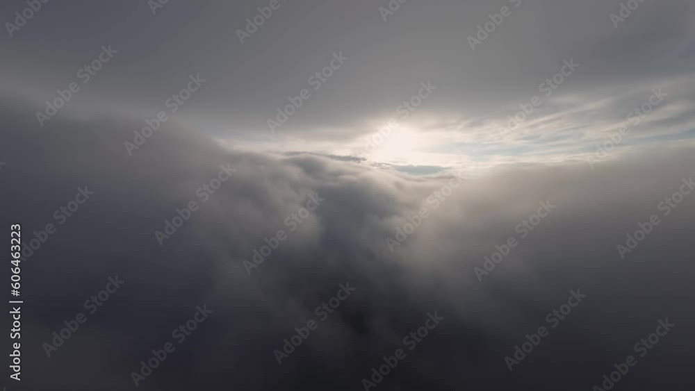 Aerial view Smoothly flying above the clouds. Pilot's point of view during a real flight before sunset. A bewitching look. Unique look. cloudscape Aerial view Smoothly flying above the clouds. Pilot's point of view during a real flight before sunset. A bewitching look. Unique look. cloudscape