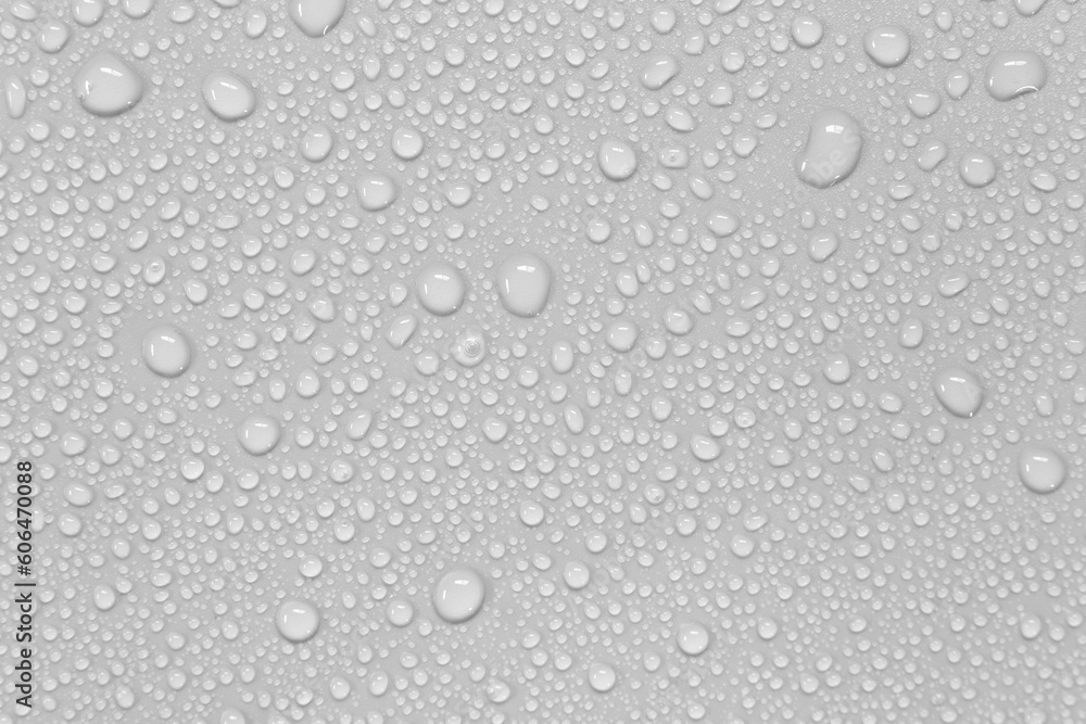 Water droplets on a gray background. Water droplets on a gray background.