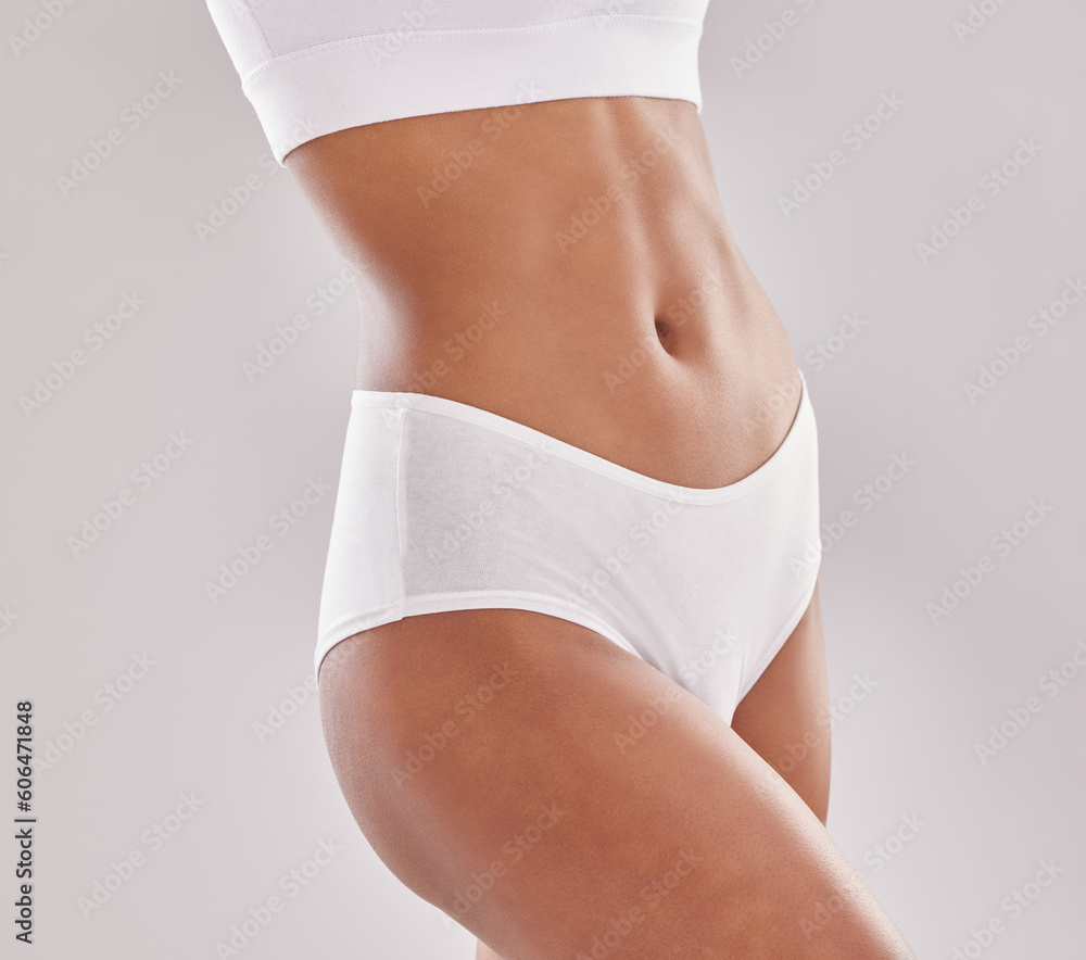 Φωτογραφία Body, care and woman in underwear in studio for diet, wellness and self love on grey background