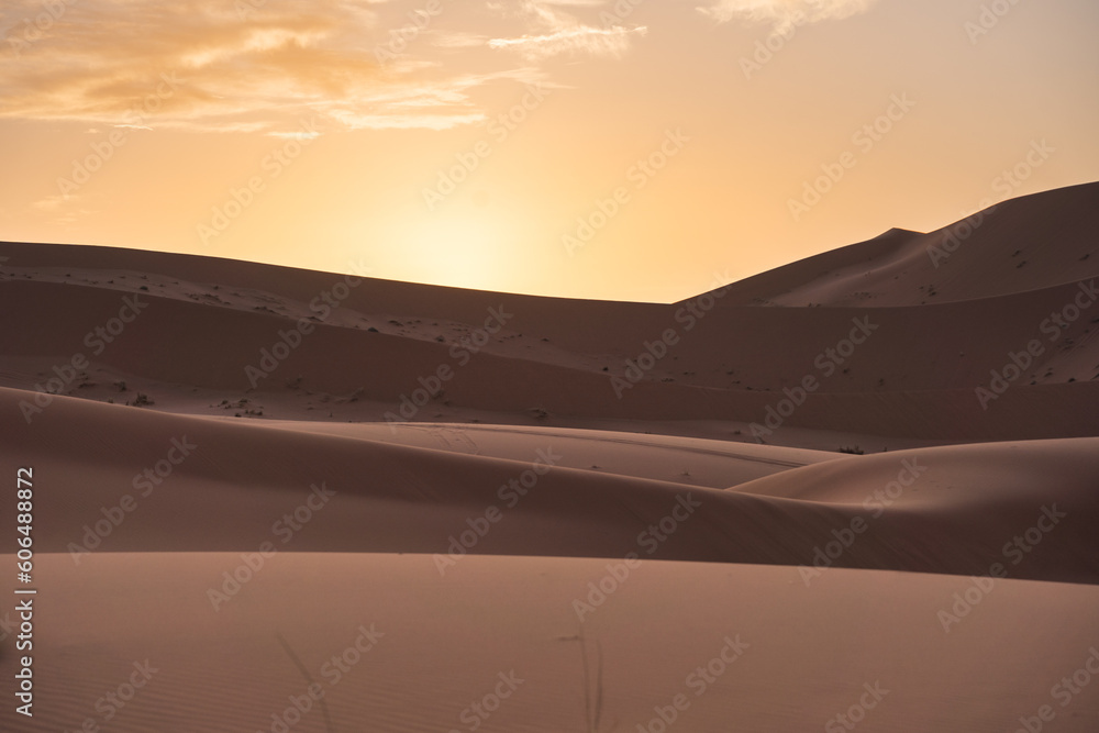 Mountain ridge under cloudy sky at sunset Mountain ridge under cloudy sky at sunset