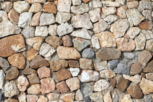 Granite stone wall  pattern of natural gray granite stone wall for background.