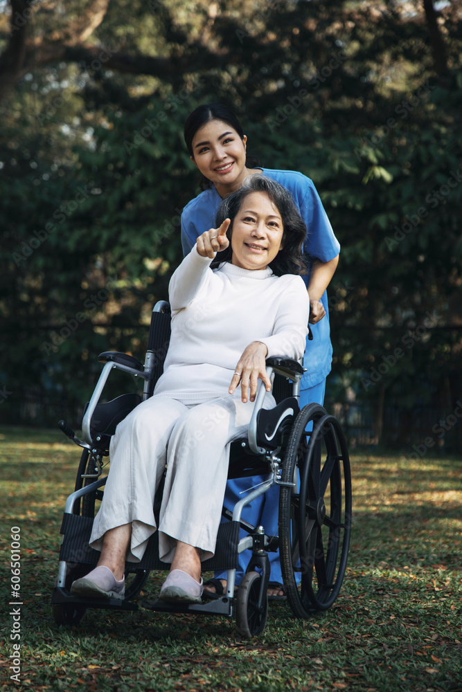 young asian physical therapist working with senior woman on walking with a walker young asian physical therapist working with senior woman on walking with a walker
