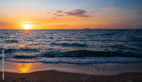 front viewpoint landscape travel summer sea wind wave cool on holiday calm coastal big sun set sky light orange golden Nature tropical Beautiful evening hour day At Bang san Beach Thailand.