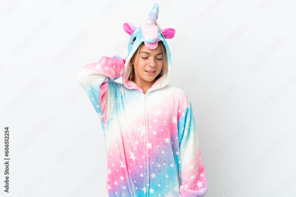 Little girl with unicorn pajamas isolated on white background with neckache Little girl with unicorn pajamas isolated on white background with neckache