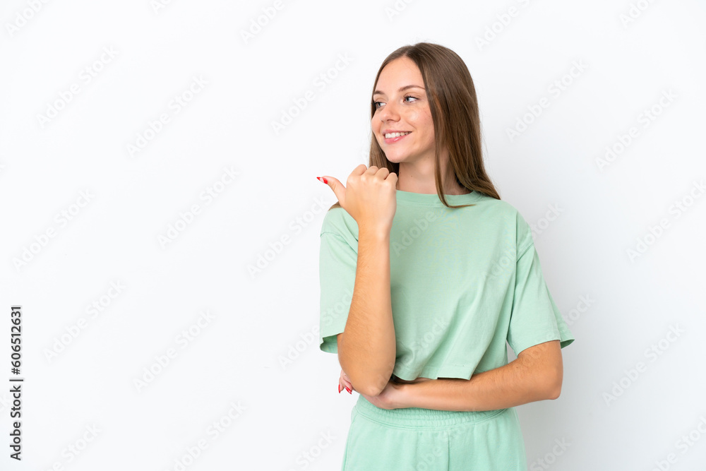 Young Lithuanian woman isolated on white background pointing to the side to present a product Young Lithuanian woman isolated on white background pointing to the side to present a product