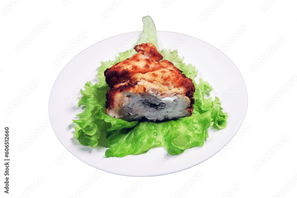 Meat cutlet with stuffing on a lettuce leaf, isolated on a white background. Plate with cutlet in Kiev, Ukraine Meat cutlet with stuffing on a lettuce leaf, isolated on a white background. Plate with cutlet in Kiev, Ukraine