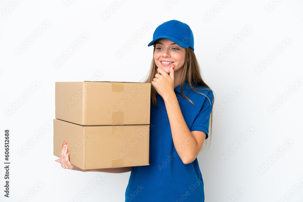 Delivery Lithuanian woman isolated on white background looking to the side and smiling Delivery Lithuanian woman isolated on white background looking to the side and smiling