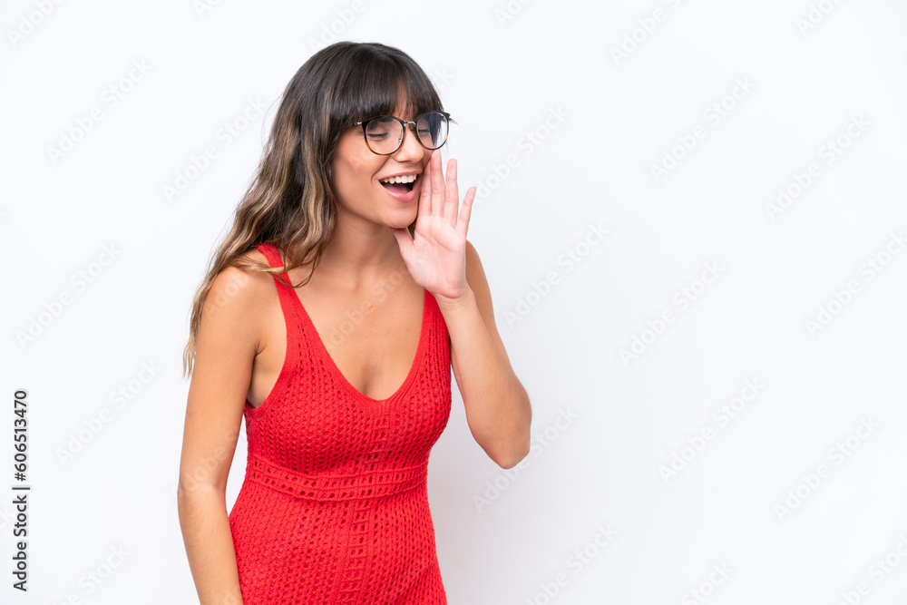 Young caucasian woman isolated on white background shouting with mouth wide open to the side Young caucasian woman isolated on white background shouting with mouth wide open to the side