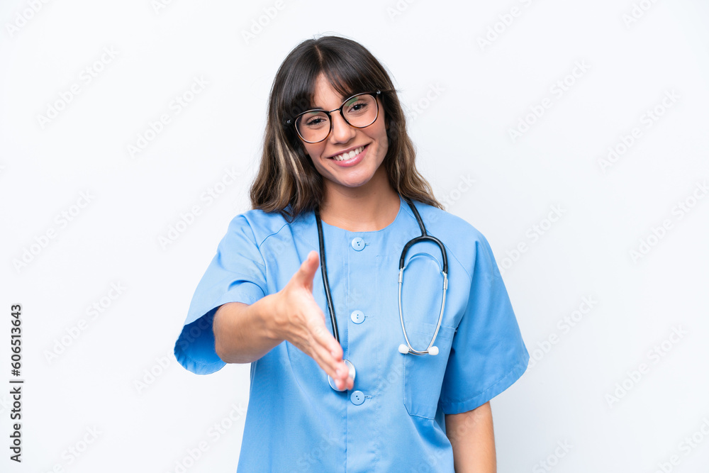 Young caucasian nurse woman isolated on white background shaking hands for closing a good deal Young caucasian nurse woman isolated on white background shaking hands for closing a good deal