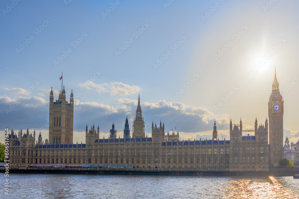 Naklejka premium Houses of Parliament and Big Ben in London at sunset with the sun backlit behind Parliament