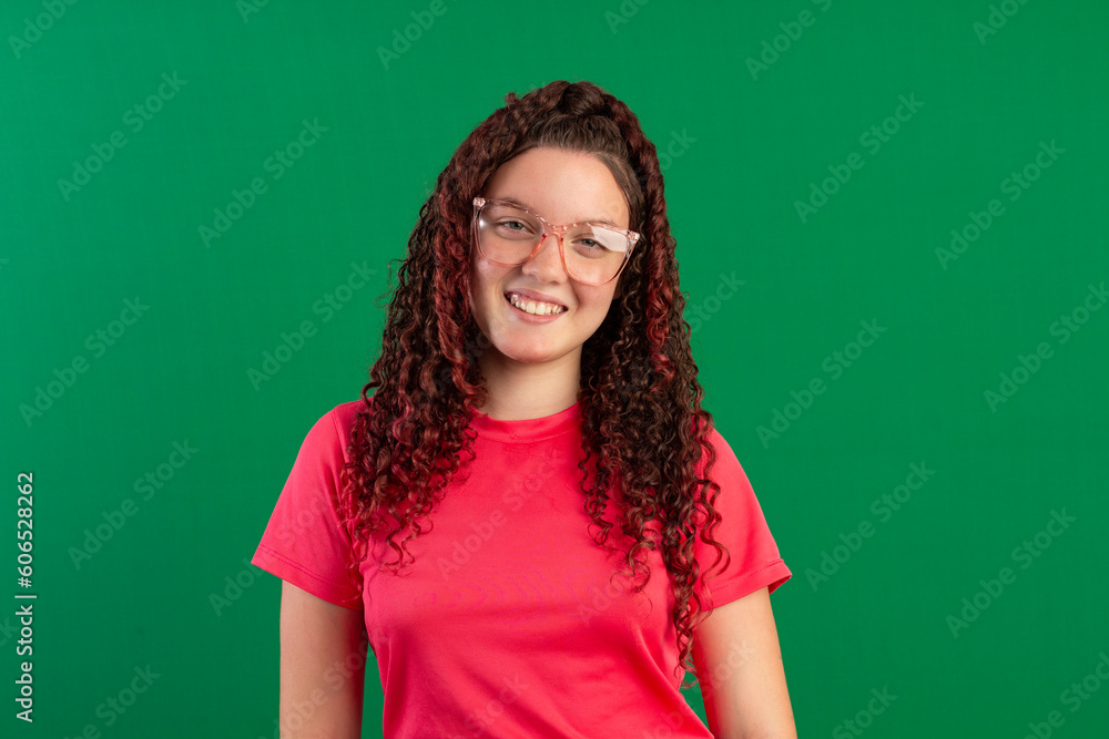 Teenager with red curly hair, wearing jeans, shirt, glasses and with various facial expressions of feelings Teenager with red curly hair, wearing jeans, shirt, glasses and with various facial expressions of feelings