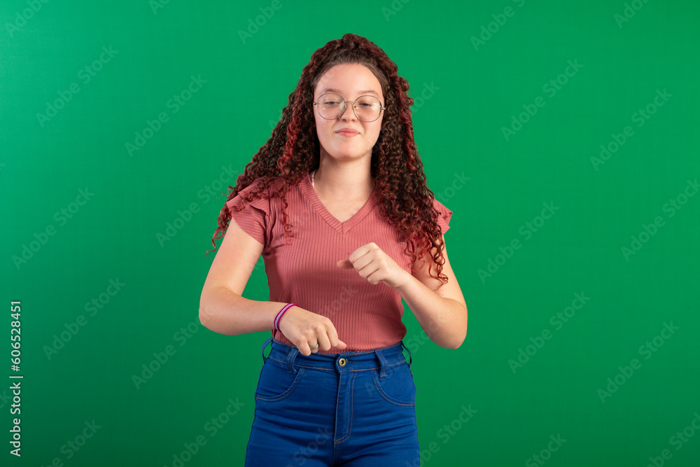 Teenager with red curly hair, wearing jeans, shirt, glasses and with various facial expressions of feelings Teenager with red curly hair, wearing jeans, shirt, glasses and with various facial expressions of feelings